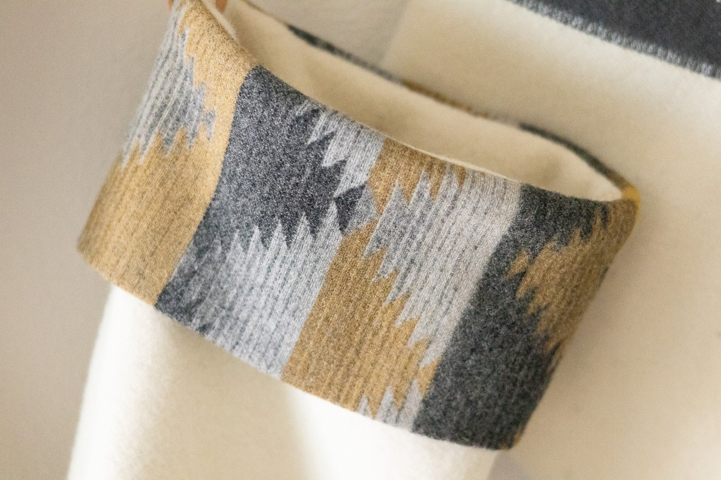 Patterned stocking cuff on a cream stocking