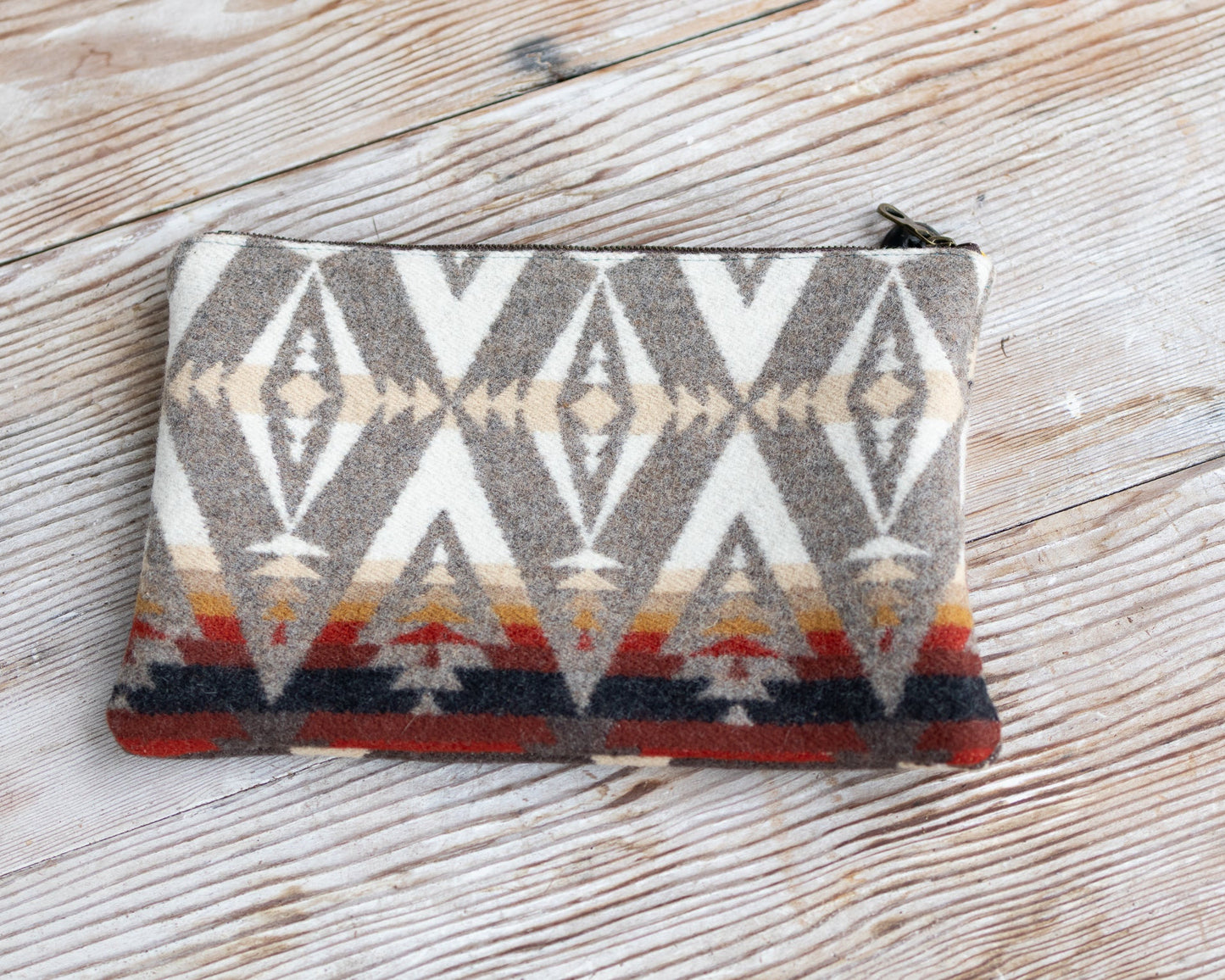 Patterned pouch on a wooden surface