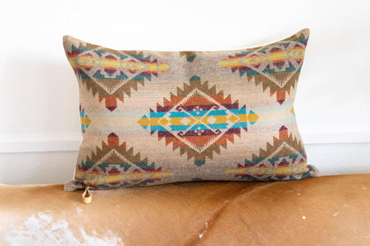 Decorative pillow with geometric pattern on a couch