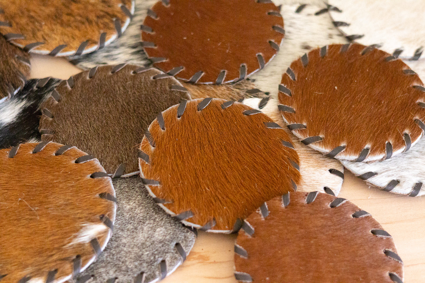 Close-up of leather samples with different textures and colors.