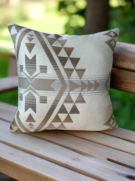 Decorative pillow with geometric pattern on a white background