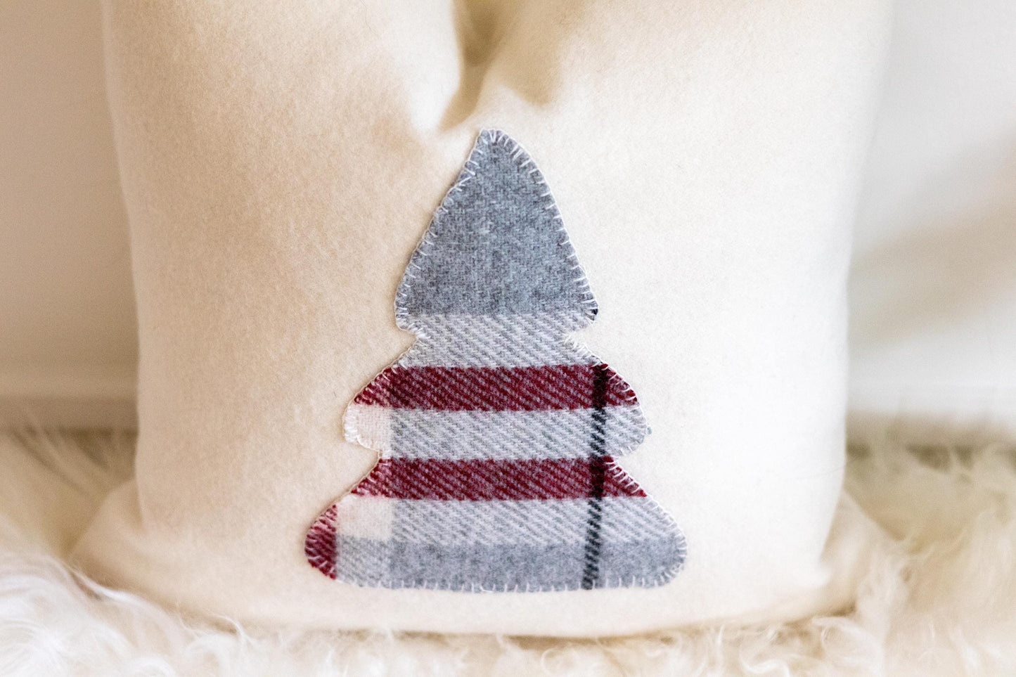 Plaid Christmas tree patch on a white fabric background