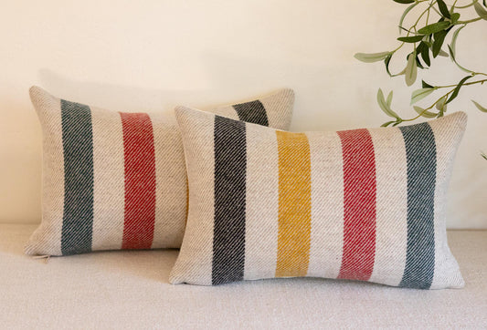 Pair of Glacier National Park Wool Lumbar Pillow Covers – White Base with Black, Red, Yellow & Green Stripes
