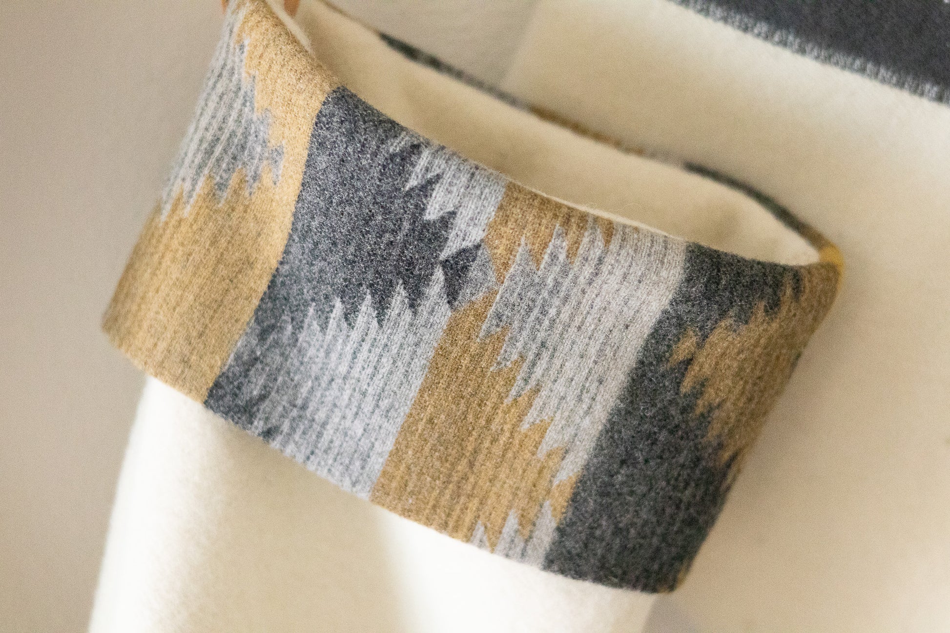 Patterned stocking cuff on a cream stocking