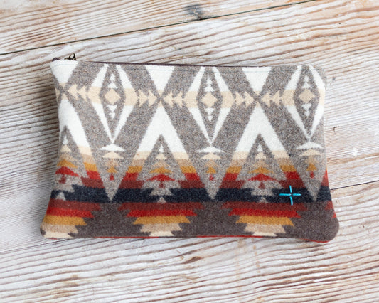 Patterned pouch on a wooden surface