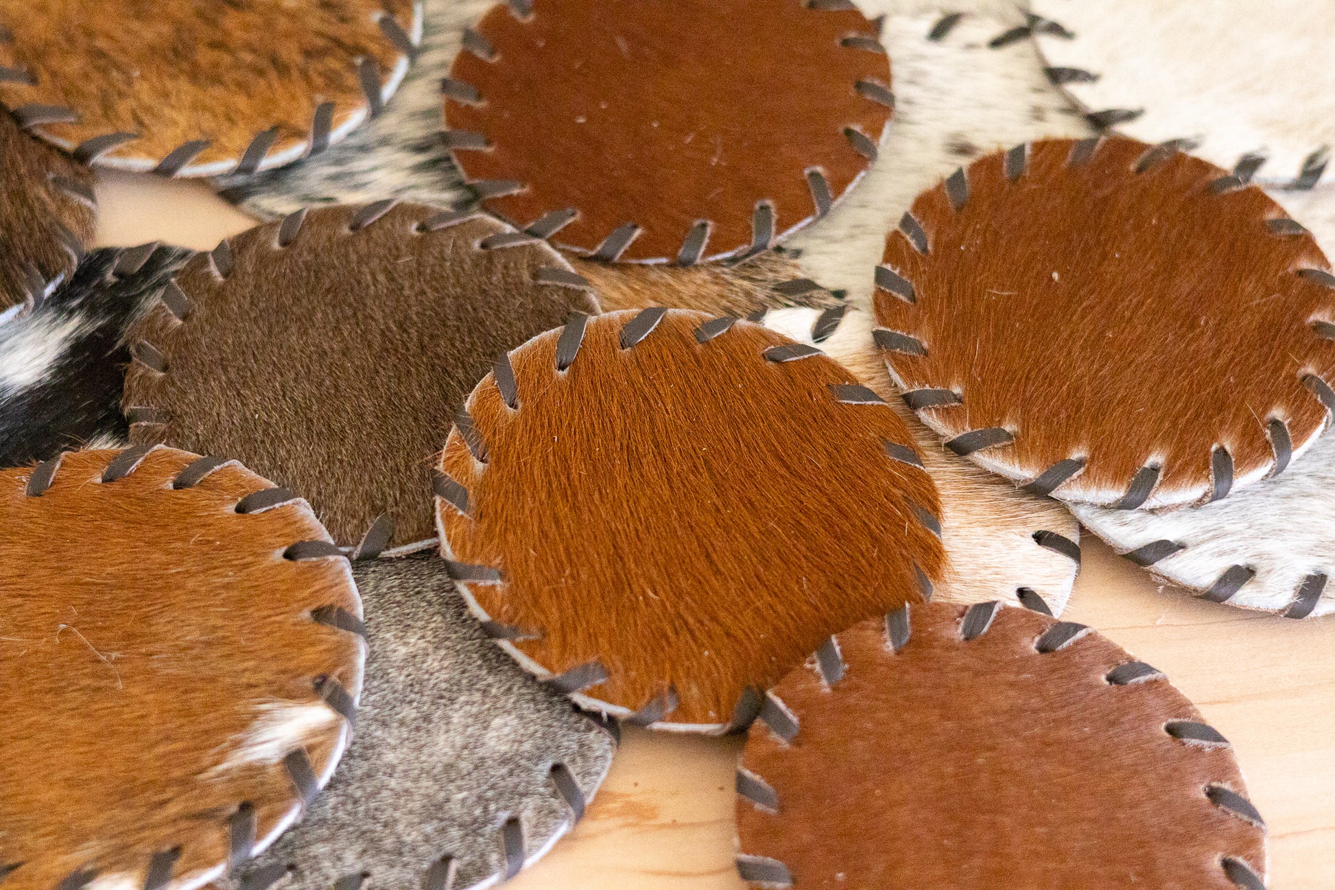Close-up of leather samples with different textures and colors.