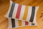 Pair of Glacier National Park Wool Lumbar Pillow Covers – White Base with Black, Red, Yellow & Green Stripes