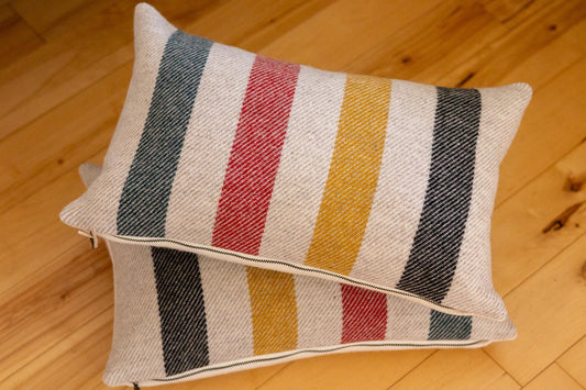 Pair of Glacier National Park Wool Lumbar Pillow Covers – White Base with Black, Red, Yellow & Green Stripes